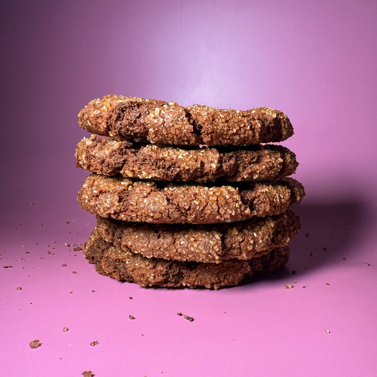 Mexican Chocolate cookies stacked and torn in half, showing the inside